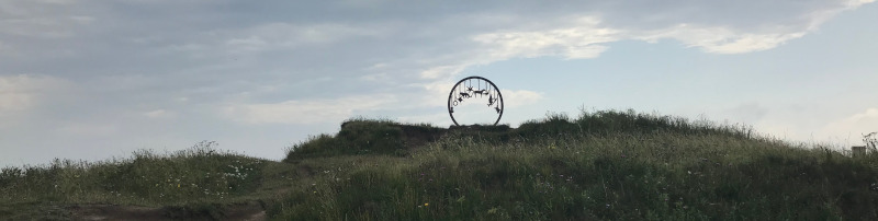 A `charm bracelet' sculpture silhouetted against the skyline.