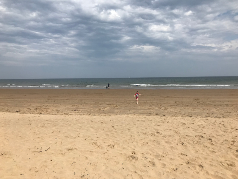 Child on a beach.