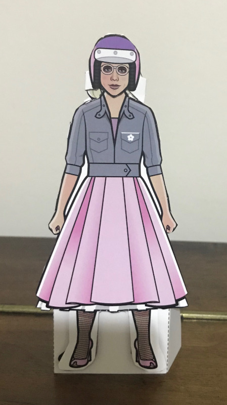 Paper Rose Doll in her pink 1950s outfit with motorcycle helmet.