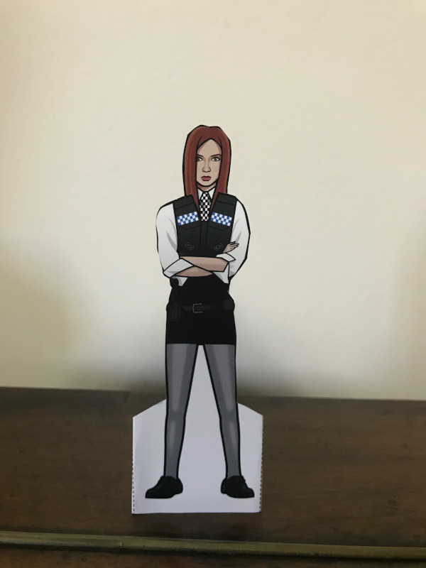 Amy in her `police` outfit.  Hair down