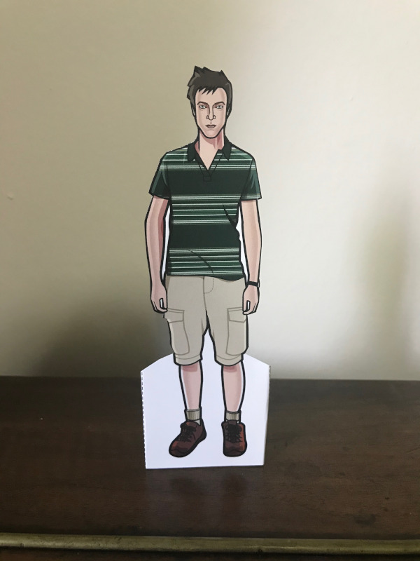 Paper doll of Rory in a green striped shirt and shorts