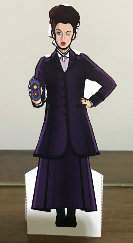 Paper doll of Missy in purple, holding her eliminator device and winking.