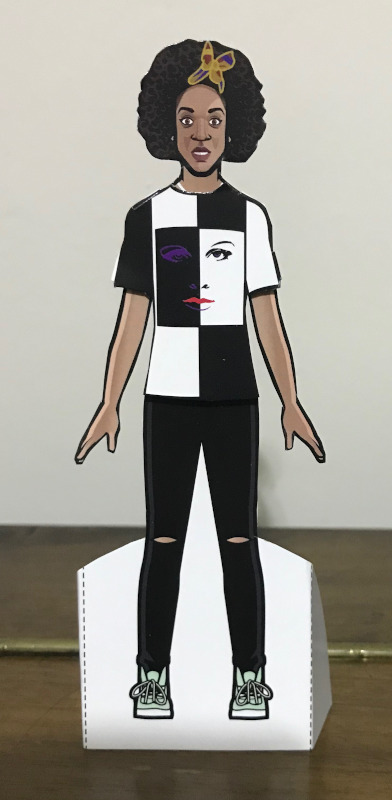 Bill paper doll with her startled face and her black and white quartered T-shirt with a face on it.