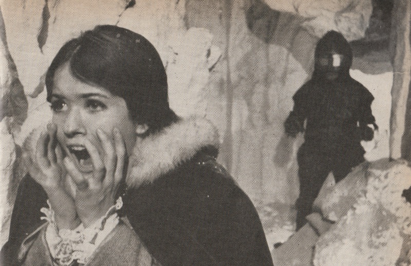 Black and White photo of Victoria screaming.  An Ice Warrior is visible behind her.