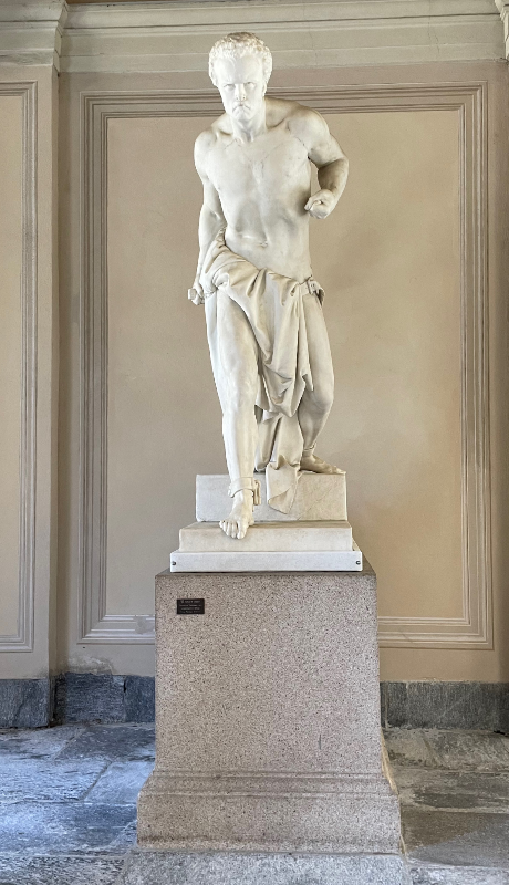 Fierce looking statue in the greek style