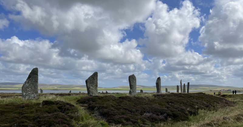 Half a circle of standing stones.