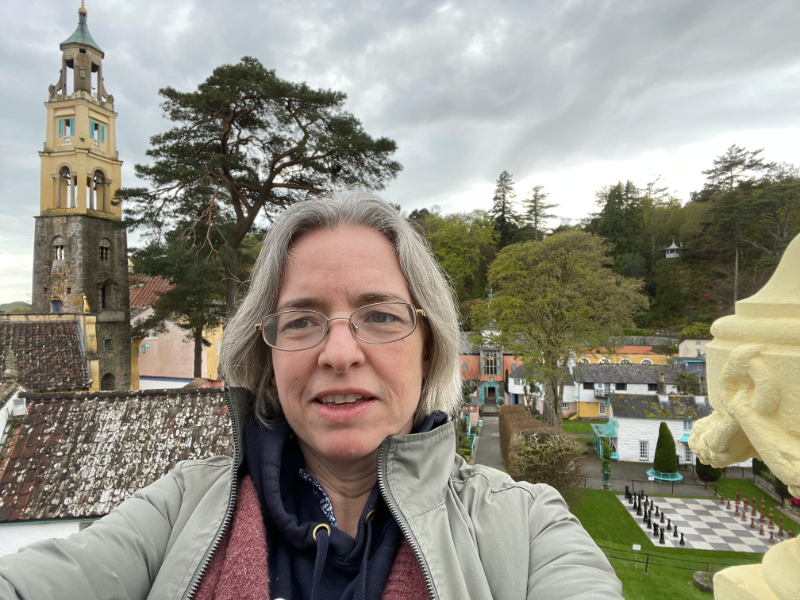 Selfie showing giant chess set.