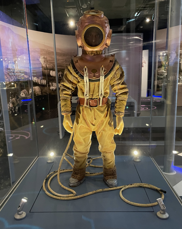 Model diving suit. The Twelfth Doctor's face is just visible in the helmet.