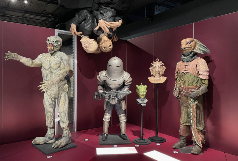 Display of a Drug, Sontaran and Sea Devil.  Head masks of a modern and classic Silurian.  The Silent hang from the ceiling.