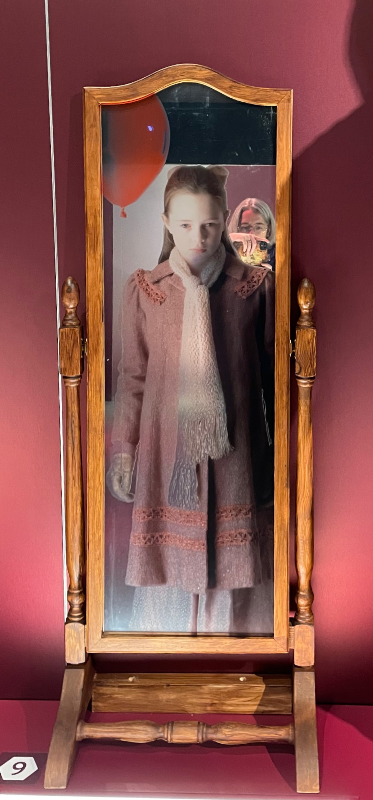 The little girl with the balloon from Human Nature/Family of Blood in the mirror.  I can just be seen taking a photo over her shoulder.