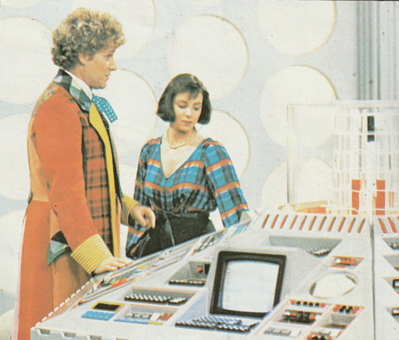 Image from The Twin Dilemma.  Colin Baker as the Doctor and Peri at the Tardis console.