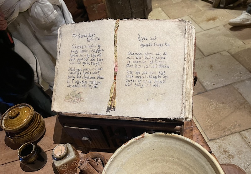 A recipe book showing recipes for Ma Grub's Best Apple Pie and Apple and Myrtle-Berry Pie