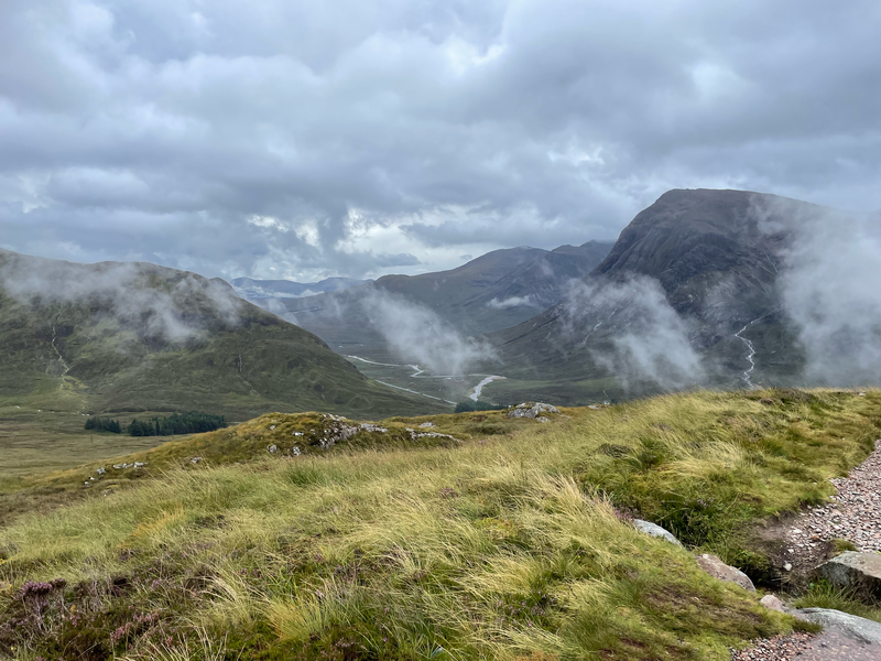 Mountains with mist about them.