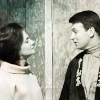 Ian and Barbara looking at each other.  Slight colour wash.