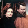 Color image of Ian and Barbara standing outside the Tardis from Marco Polo.