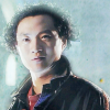 Chang Lee from Doctor Who the TV Movie with a blue background