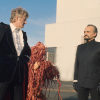Delgado Master and the Third Doctor with an Axon in the background.