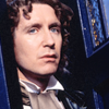 The Eighth Doctor looking out of the Tardis