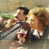 Eleven and River drinking wine.