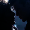 Eleven and River kissing.  Mostly in silhouette.