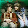 The fourth Doctor and Sarah.  Sarah leaning in to say something.
