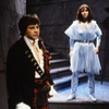 Jamie close by with Zoe standing behind him in a bubble wrap dress from The Five Doctors