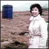 Susan from the Five Doctors.  Tardis in background.