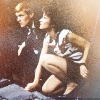 Tegan and Turlough crouched down