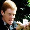 Turlough gazing at the crystal for communicating with the Black Guardian
