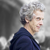 The Twelfth Doctor side on but glancing at the camera with a slight smile.  Floofy hair.