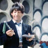 The Second Doctor holding his recorder