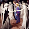 A circle of weeping angels surround sally sparrow and Larry Nightingale