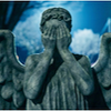 A weeping angel with its eyes covered.