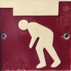 Person ducking under low ceiling. White on Red.