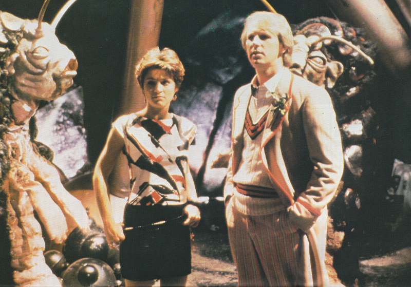 Picture from Frontios.  The fifth Doctor and Tegan stand surrounded by two tractators - giant woodlice type things.
