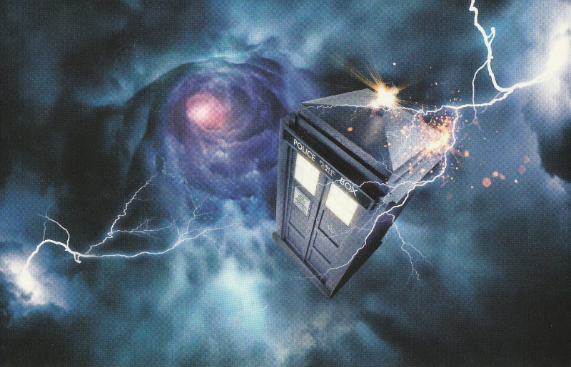 The tardis, swirling through a blue vortex with lightening around it.