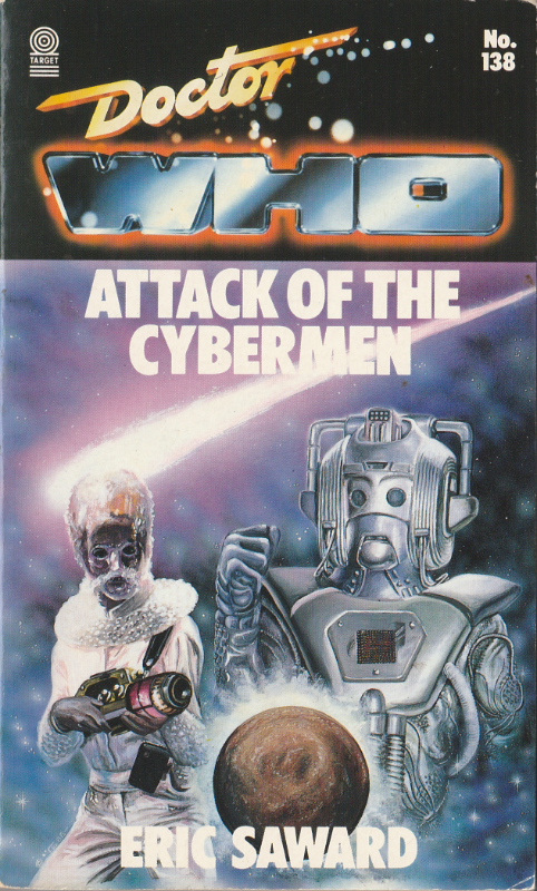 Cover of the Attack of the Cybermen Target Novelisation by Eric Saward.  Novelisation number 139.  Images of a Cryon holding a gun, a Cyberman with its fist raised, a planet and a fiery stripe in the background that is presumably supposed to be Halley's Comet.  General blue/pink colour scheme.