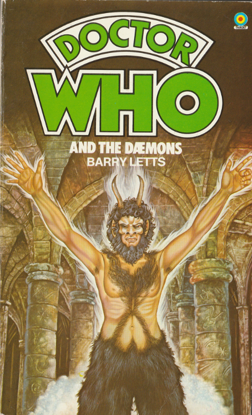 Cover of the Target Novelisation of The Daemons by Barry Letts.  A painting of the Daemon Azal, arms upraised.  Behind him is a crypt of pillars and arches.  He surrounded by a steam effect.